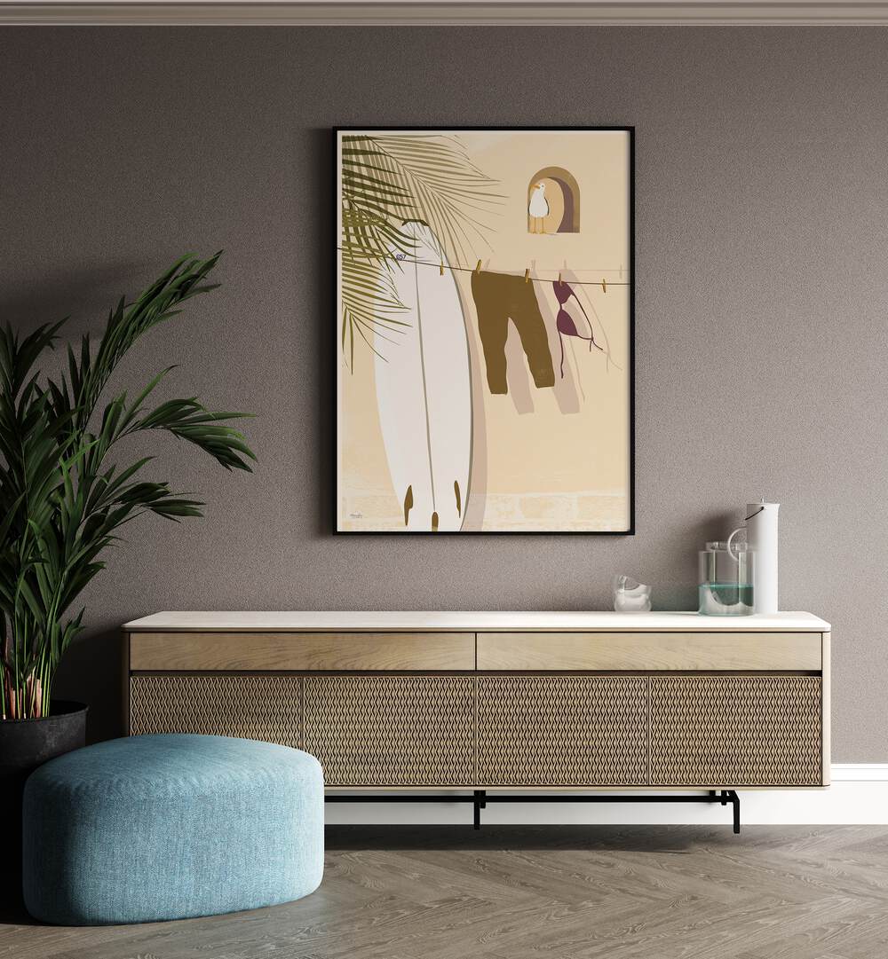 Still Life By Andi Bell Beach Prints in Black Plain Frame on a brown wall placed above a console tale