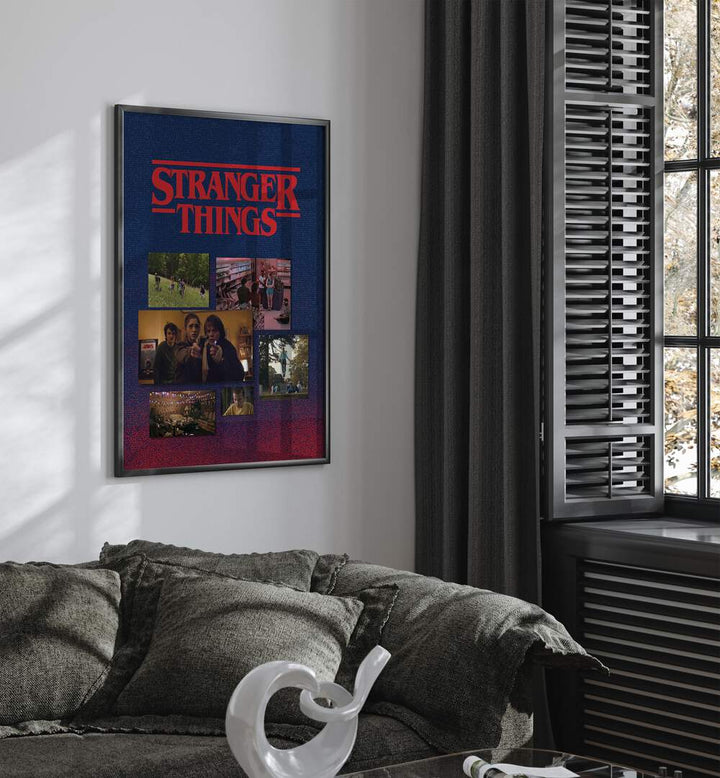 Stranger Things By Grishma Korjani Movie Posters in Black Plain Frame placed on a White Colored Wall near a Grey Sofa in the Living Room