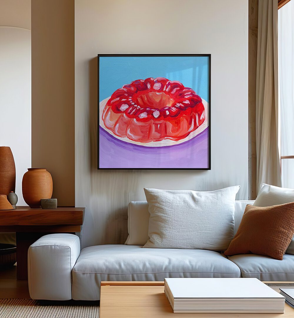 Strawberry Jello By Key And Sea Creative Bar and Cafe Art Print in Black Plain Frame on a cream wall behind a sofa for living room