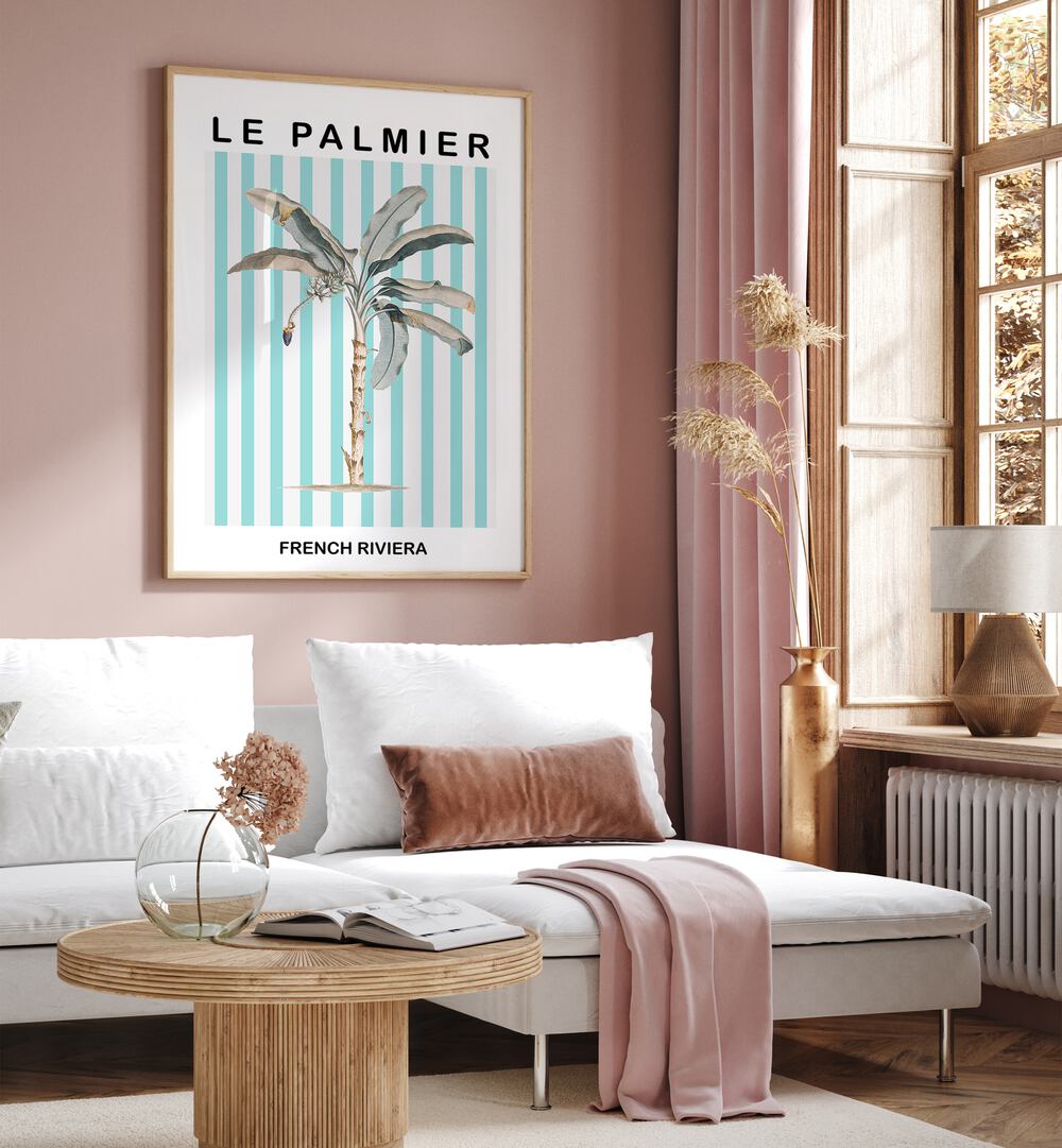 Striped Palm Tree By Grace Digital Art Co Beach Prints in Oak Wood Plain Frame placed on a pink wall behind a white sofa