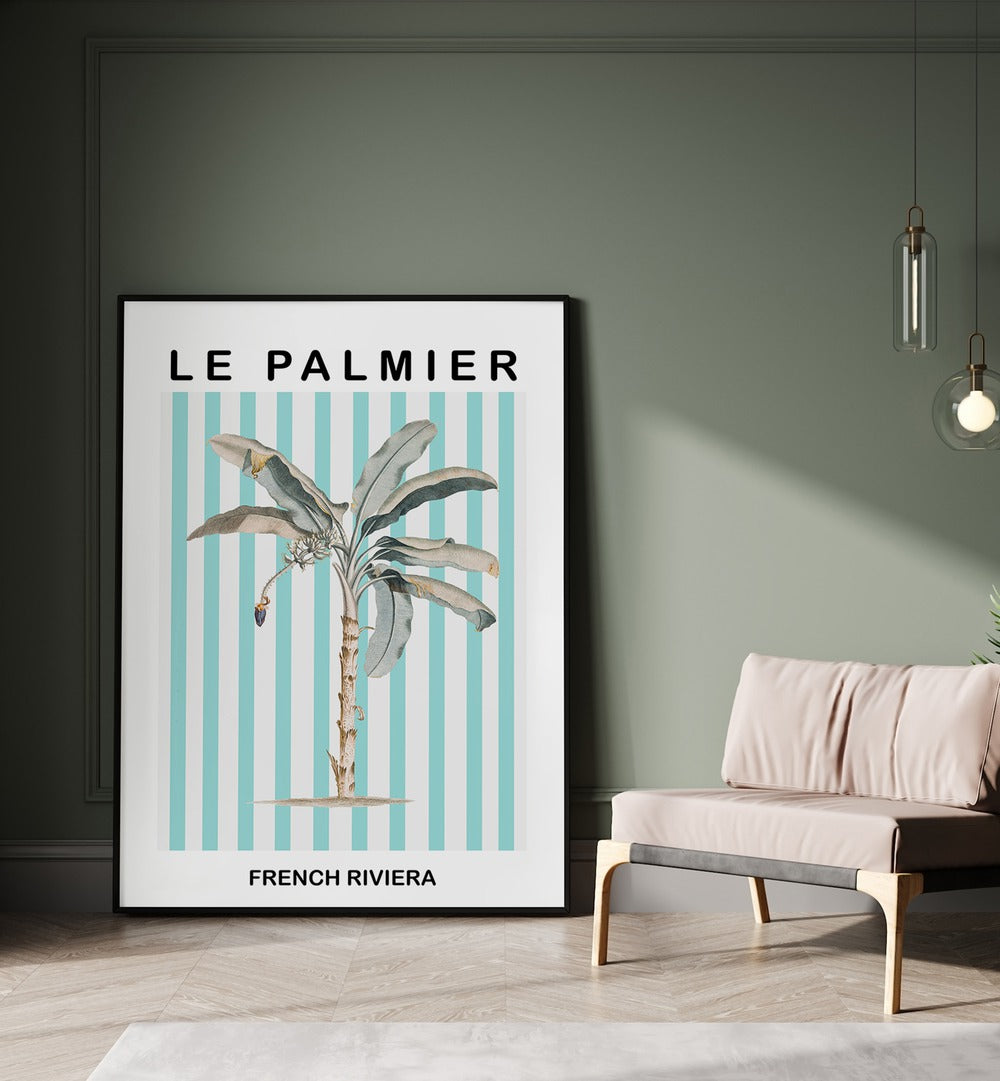 Striped Palm Tree By Grace Digital Art Co Beach Prints in Black Plain Frame placed on a floor beside a sofa