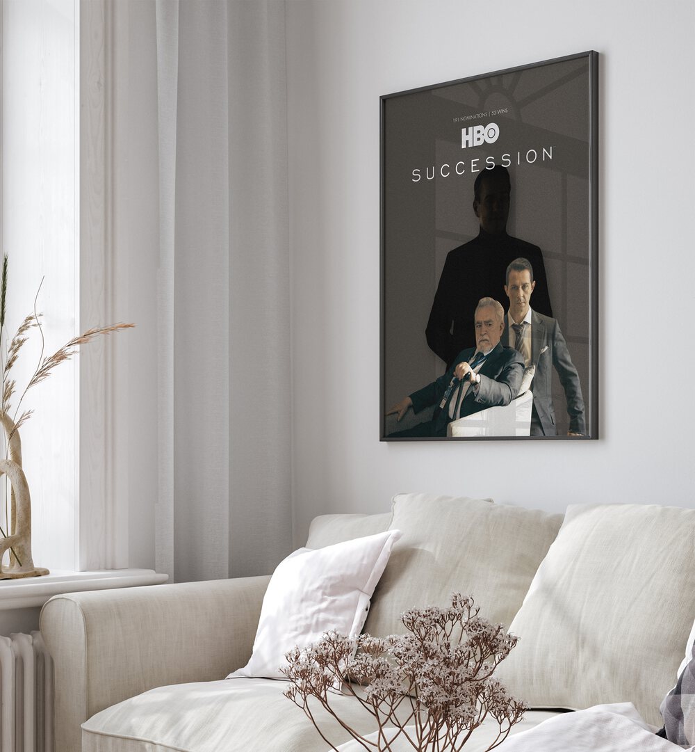 Succession By Grishma Korjani Movie Posters in Black Plain Frame placed on a White Colored Wall near a White Sofa in the Living Room