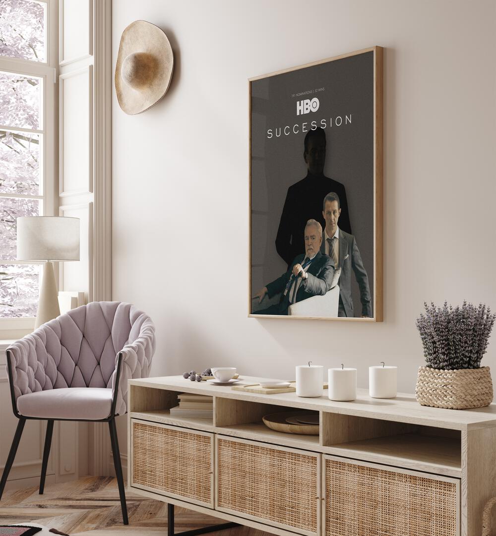 Succession By Grishma Korjani Movie Posters in Oak Wood Plain Frame placed on a Cream Colored Wall above a Console Table in the Drawing Room