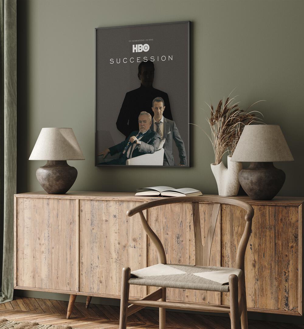 Succession By Grishma Korjani Movie Posters in Black  Plain Frame placed on a Green Colored Wall above a Console Table in the Drawing Room