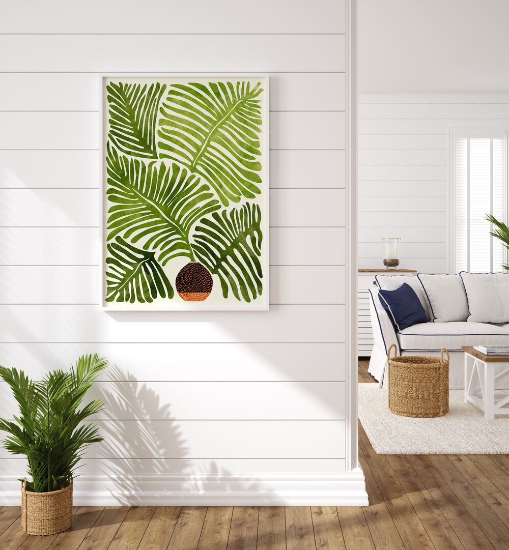 Summer Fern by Kristian Gallagher Botanical Flower Paintings Floral Paintings in White Plain Frame placed on a white wall beside a plant