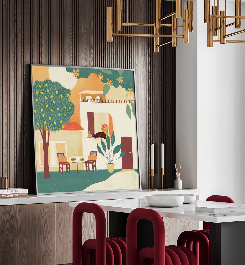 Summer Lunch by Shriya Bhattacharya Art Print in Black Plain Frame on a console table behind a dining table