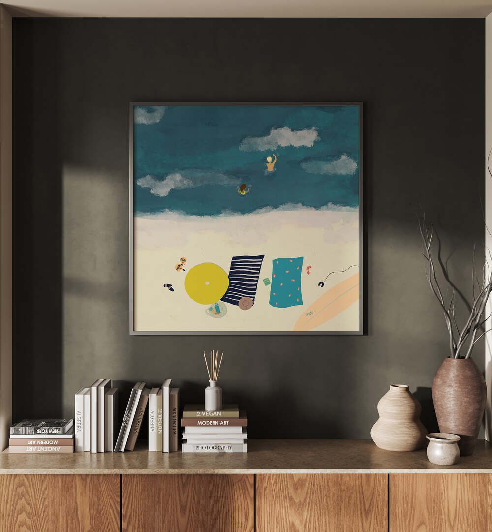 Summertime Splash Beach Prints Coastal Wall Art Prints in Black Plain Frame placed on a Dark Grey Colored Wall above a Console Table in the Living Room