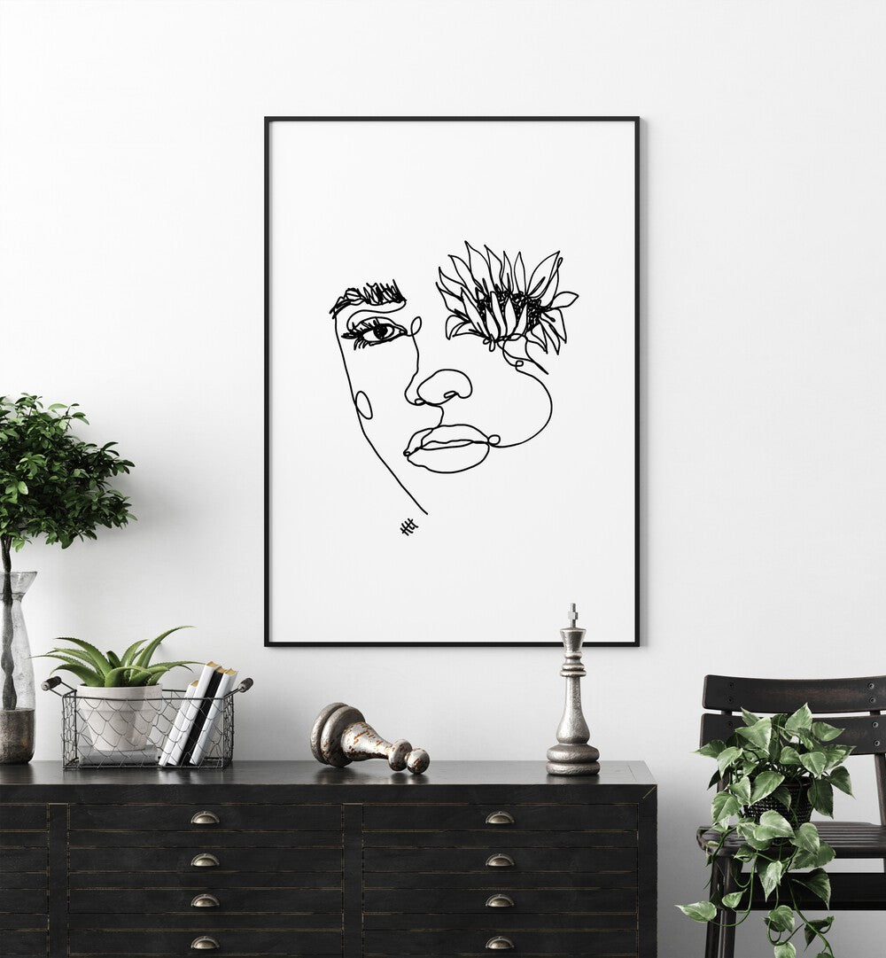 Sun in My Eyes by Hanna Lee Tidd Line Art Paintings Line Art Prints in Black Plain Frame placed on a wall behind a table