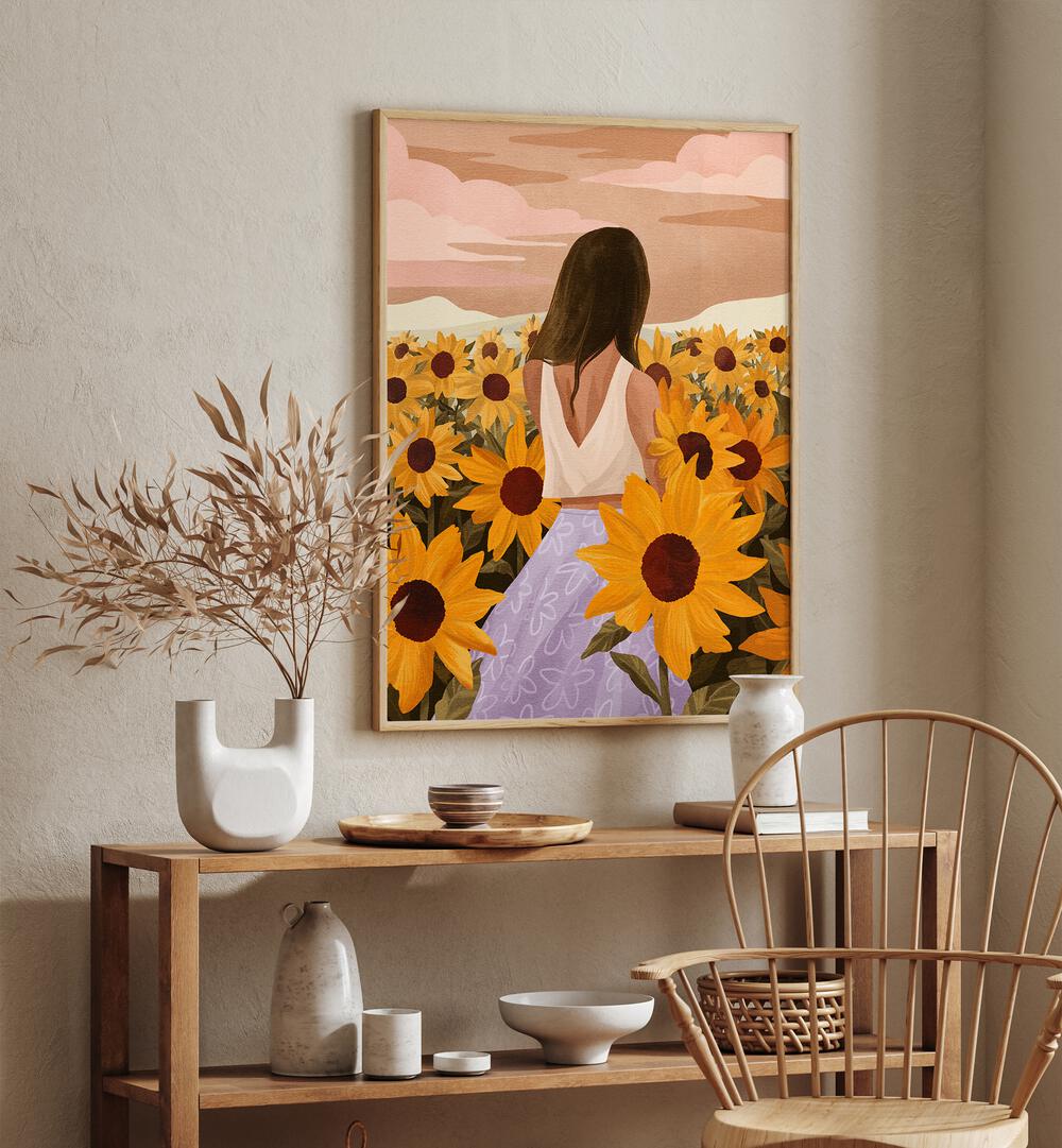 Sunflower Evenings By Goed Blauw Portraits & Figurative Illustrations in Oak Wood Plain Frame placed on a Cream Colored Wall above a Table in the Drawing Room