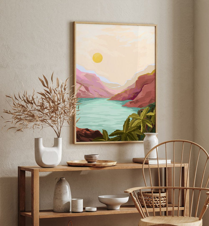 Sunny Paradise By Goed Blauw Landscape Art Prints in Oak Wood Plain Frame placed on a Beige Colored Wall above a Console Table in the Drawing Room