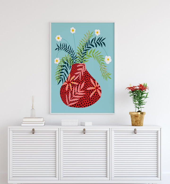 Sunny Side Up Flower Pot By Uma Gokhale Botanical Paintings in White Plain Frame on a white wall above a console table