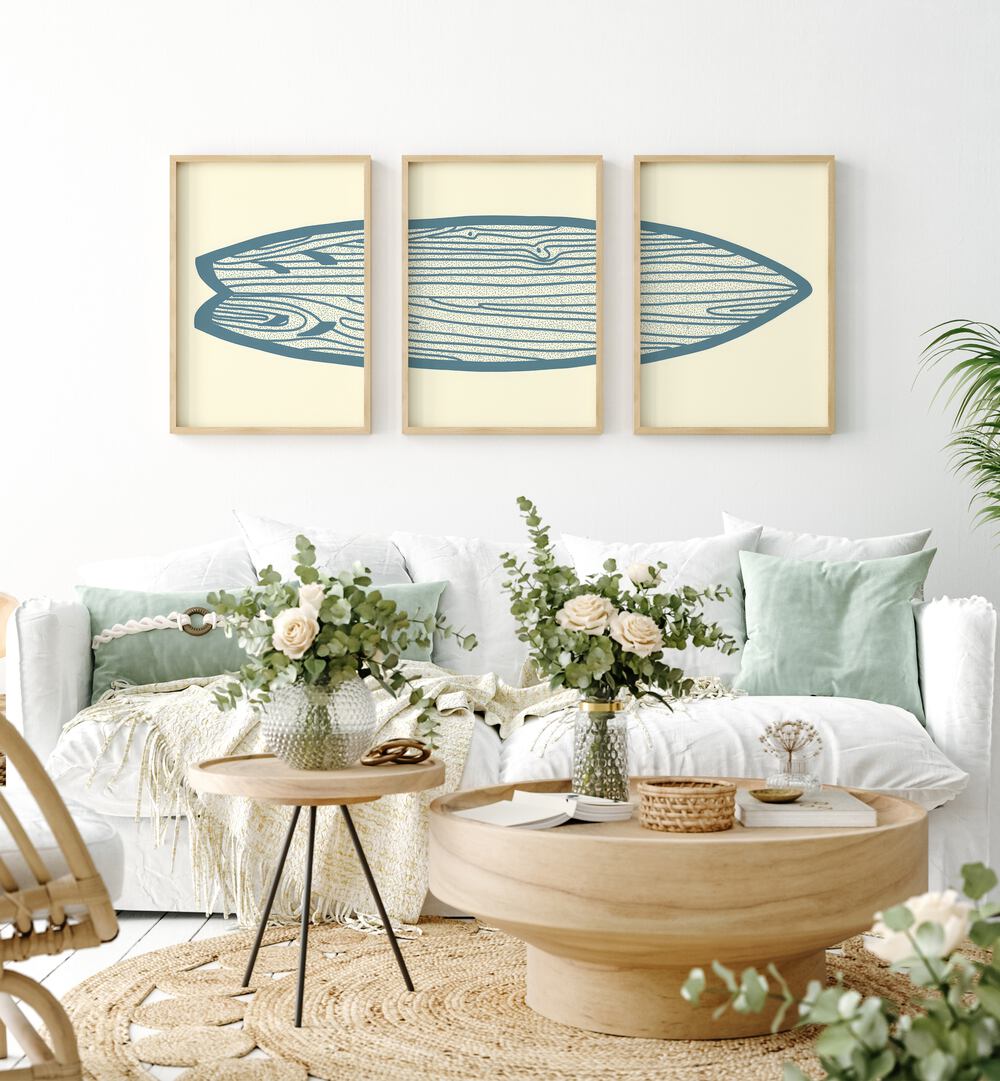 Surf Board Artworks Set Of 3 Paintings in Oak Wood Plain Frame placed on a wall living room wall behind a sofa