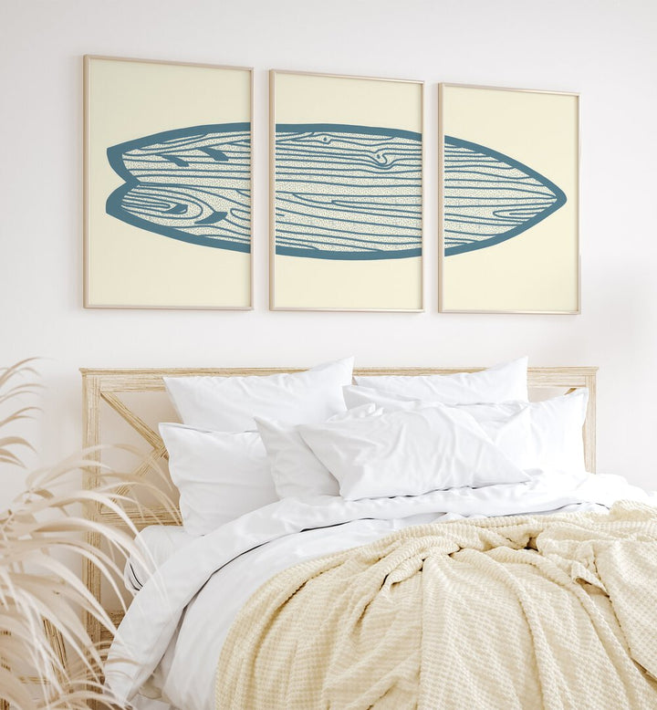 Surf Board Artworks Set Of 3 Paintings in Oak Wood Plain Frame placed on a wall behind a bed in the bedroom