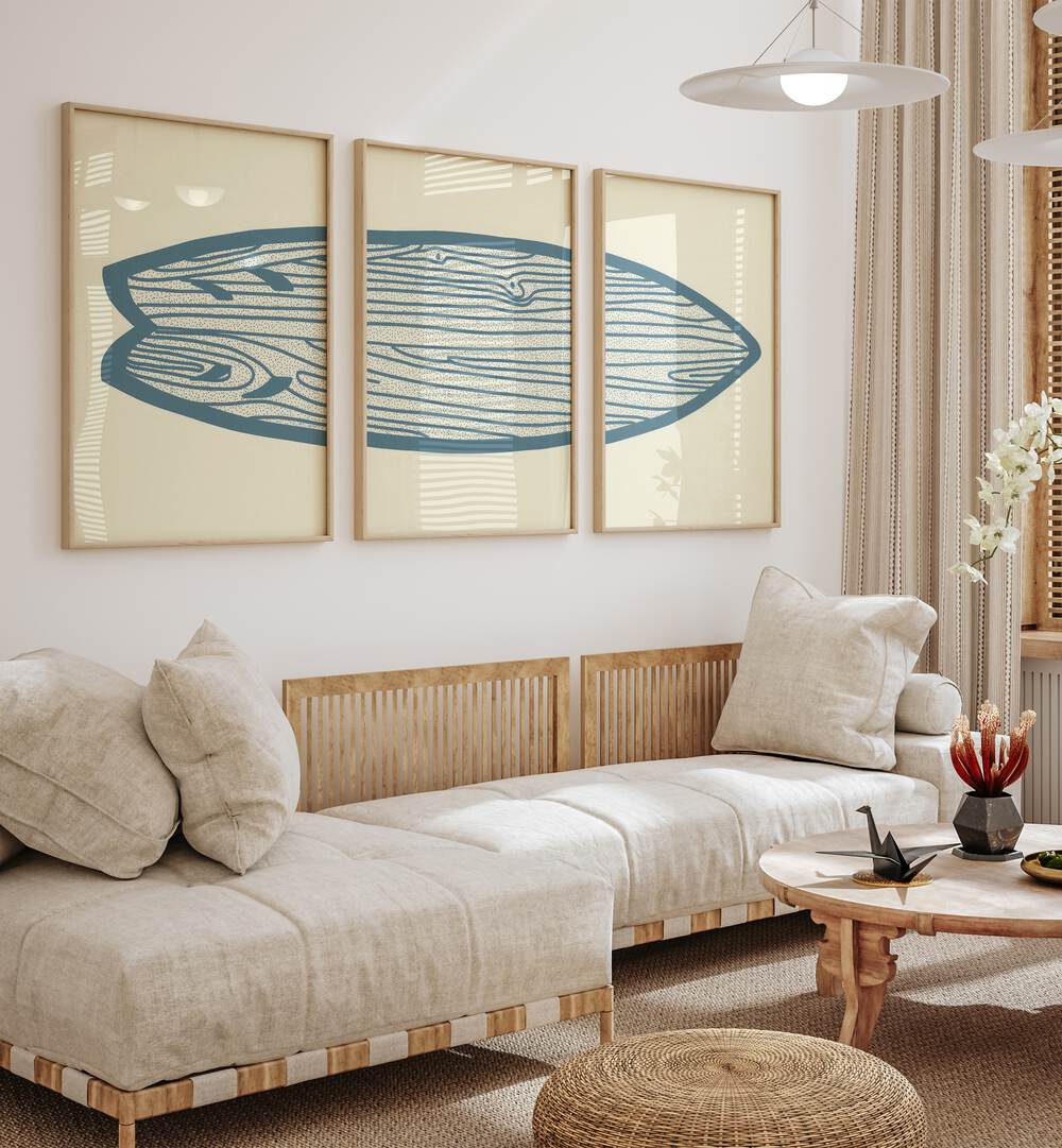 Surf Board Artworks Set Of 3 Paintings in Oak Wood Plain Frame placed on a wall living room wall behind a sofa