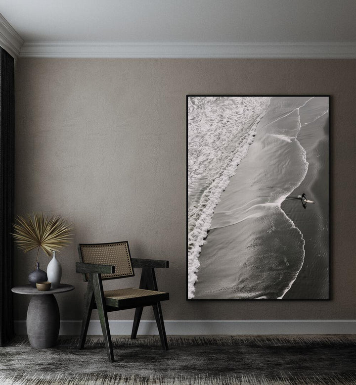 Surf Noir Beach Prints Coastal Wall Art in Black Plain Frame placed on a Beige Colored Wall in the Drawing Room