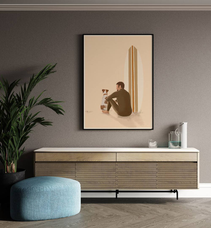 Surf Team By Andi Bell Beach Prints in Black Plain Frame on a brown wall placed above a console table