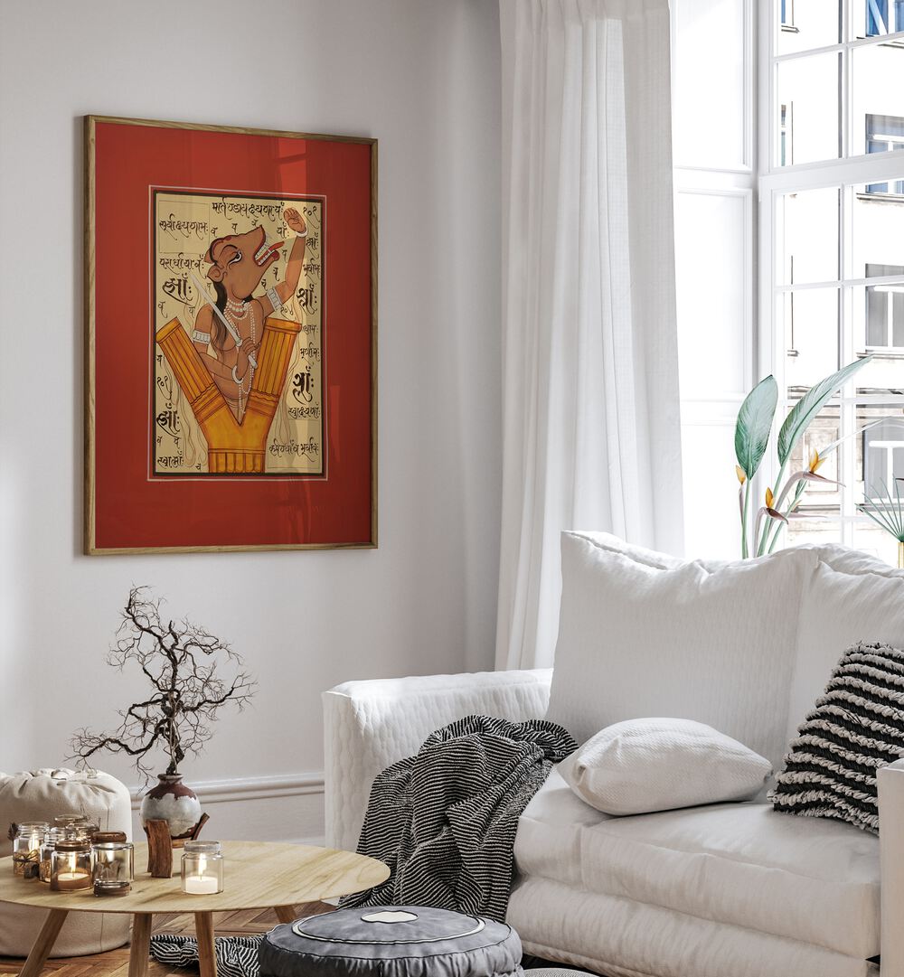 Tantra Artwork Indian Art Painting Artwork in plain oakwood frame on white wall beside a sofa 