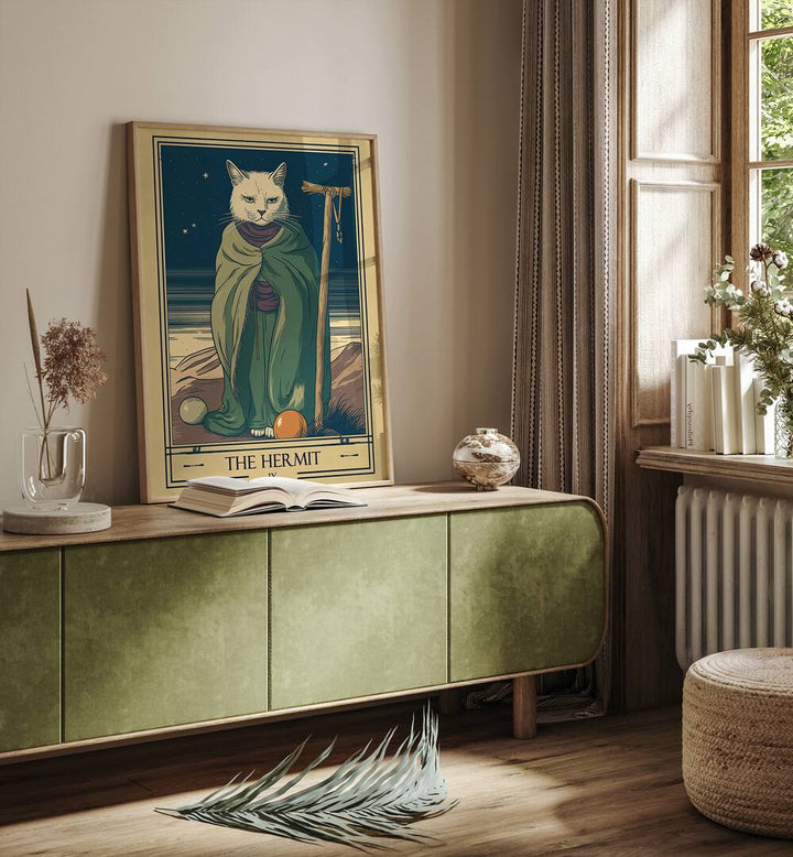 Tarot Card The Hermit Zodiac & Tarot Art Painting Artwork in plain oakwood frame on a console table beside a window