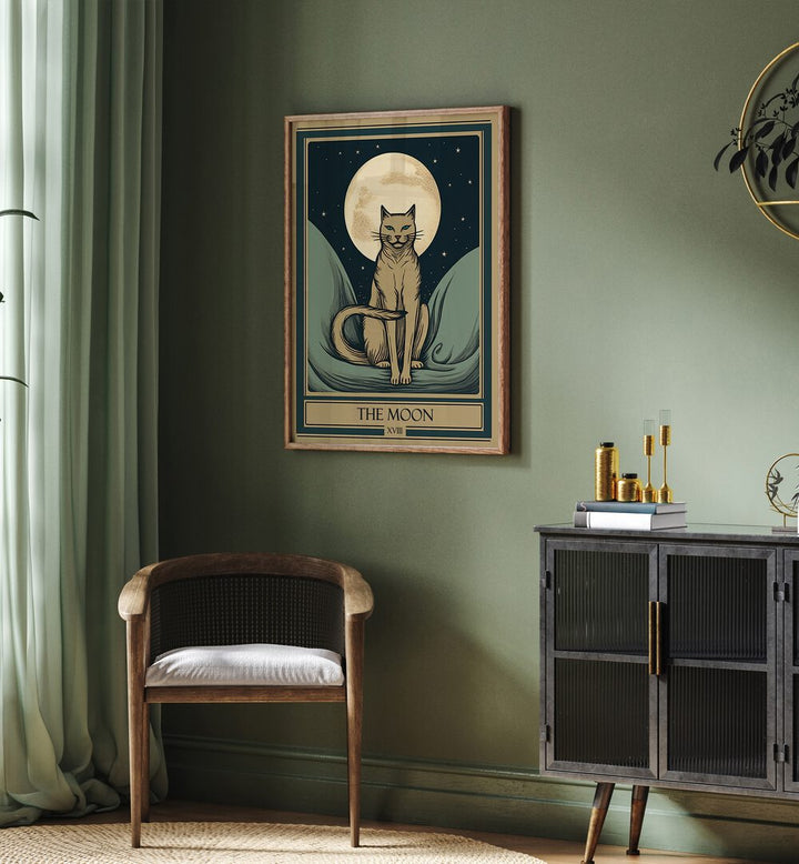 Tarot Card The Moon Zodiac & Tarot Art Painting Artwork in plain oakwood frame behind a chair on a green colour wall