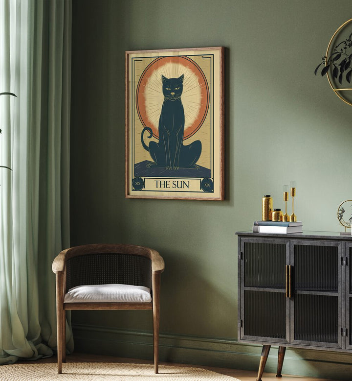 Tarot Card The Sun Zodiac & Tarot Art Painting Artwork in plain oakwood frame behind a chair on a green colour wall