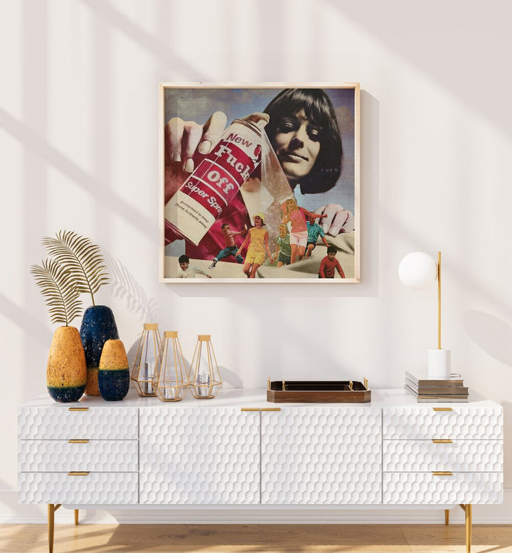 The F Off Super Spray Surreal Art Painting Artwork in plain oakwood frame above a console table on a white wall