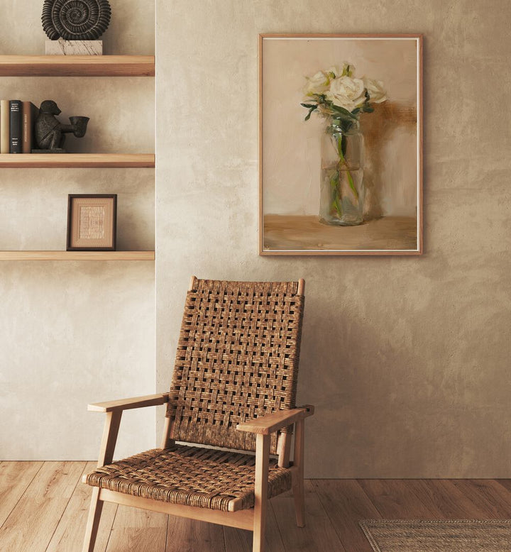 The Grace Of White Rose Vintage Art Painting Artwork in plain oakwood frame behind a chair on a beige colour wall