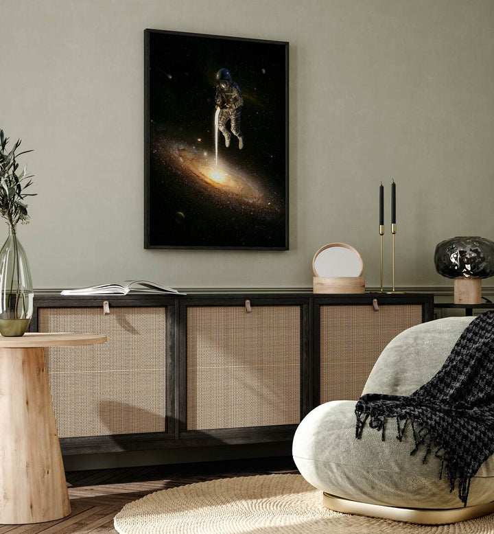 The Milky Way By Francis Minoza Astronaut & Nasa Paintings, Space Art Prints Artwork in Black Plain Frame placed on a Sage Green Colored Wall placed above a Console Table in the Drawing Room
