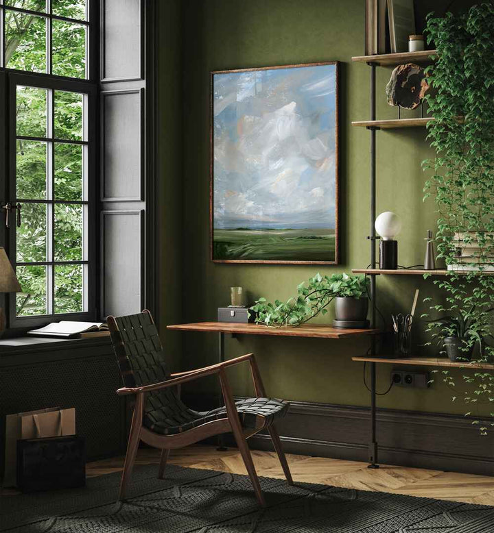 A serene room showcasing "THIS LAND, ABSTRACT PAINTINGS," featuring evocative landscapes and soothing colors.