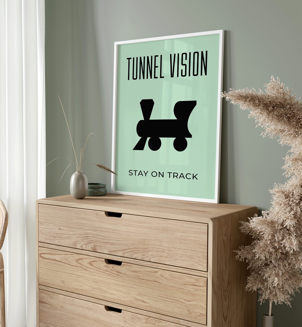 Tunnel Vision Money Art Artwork in plain white frame kept on console table near window