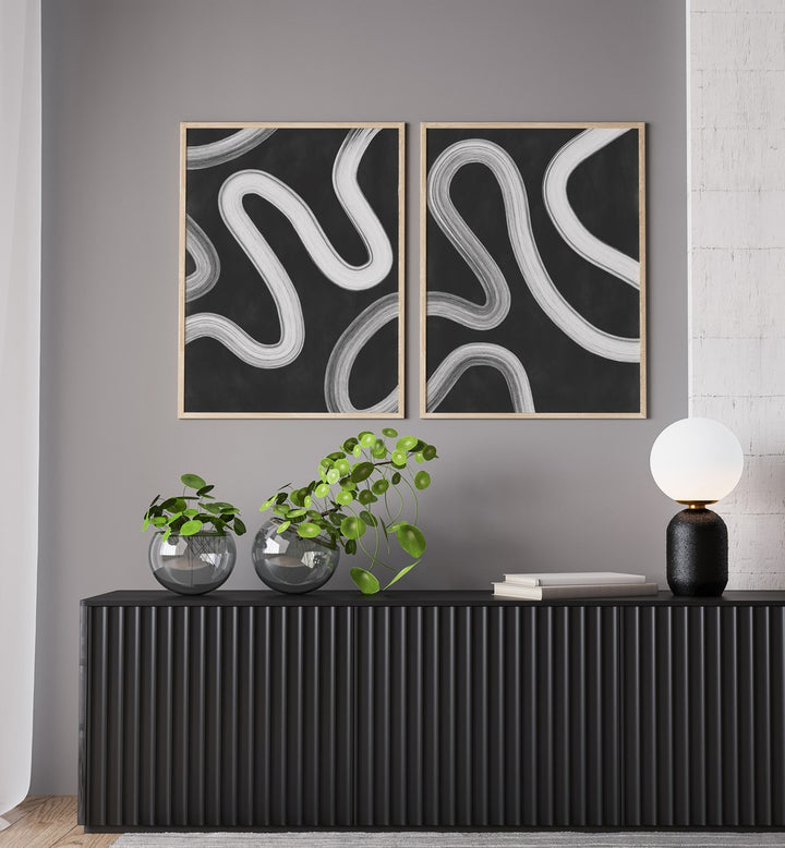 Stylish wall decor featuring the TYPOGRAPHIC CHAOS SET, SET OF 2 PAINTINGS for a modern living space transformation.