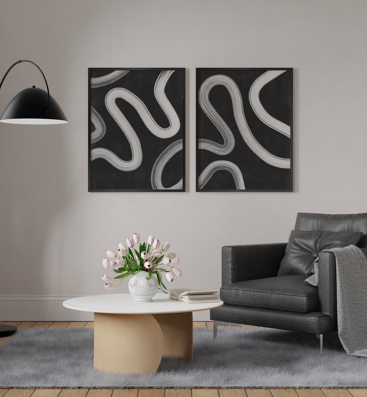 Bold and dynamic, the TYPOGRAPHIC CHAOS SET, SET OF 2 PAINTINGS elevates modern living spaces with striking art.