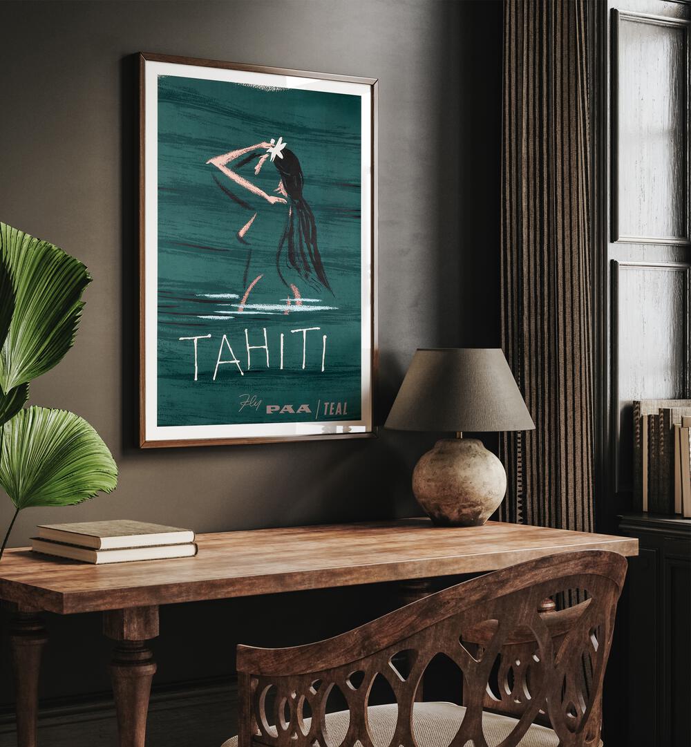 Tahiti  Retro Travel Posters in Oak Wood Plain Frame placed on a wall behind a console table