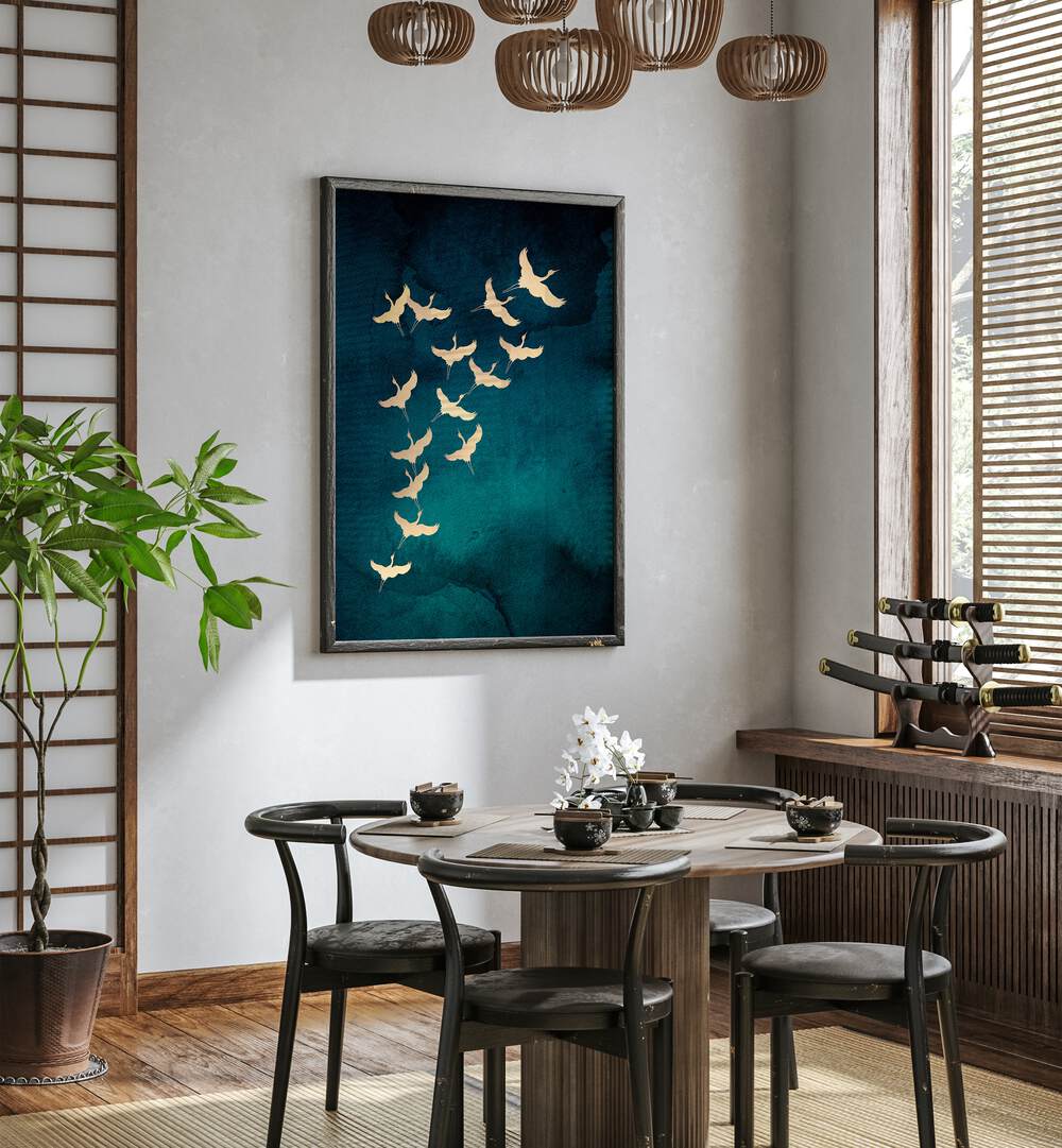 Teal Flying Cranes By Aureous Wildlife Art Prints in Dark Wood Plain Frame placed on a White Colored Wall near a Coffee Table in the Dining Room