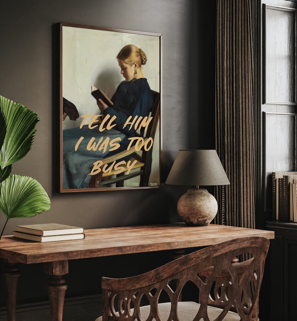 Tell Him I Was Too Busy by the Art Concept Altered Art Prints in Dark Wood Plain Frame placed on a wall above a study table