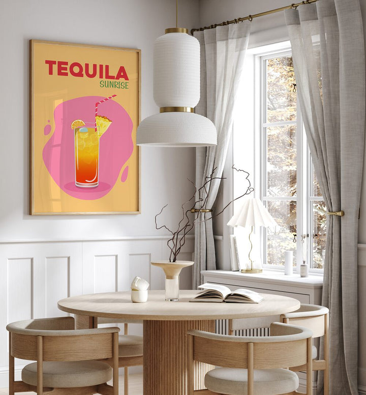 Tequila Sunrise Cafe Art Prints Cafe Posters in Oak Wood Plain Frame placed on a wall in a dining room area beside a window and behind a dining table