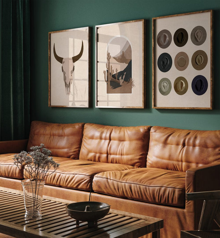 Texas Ranch Set Of 3 Paintings in Dark Wood Plain Frame placed on a living room wall behind a sofa