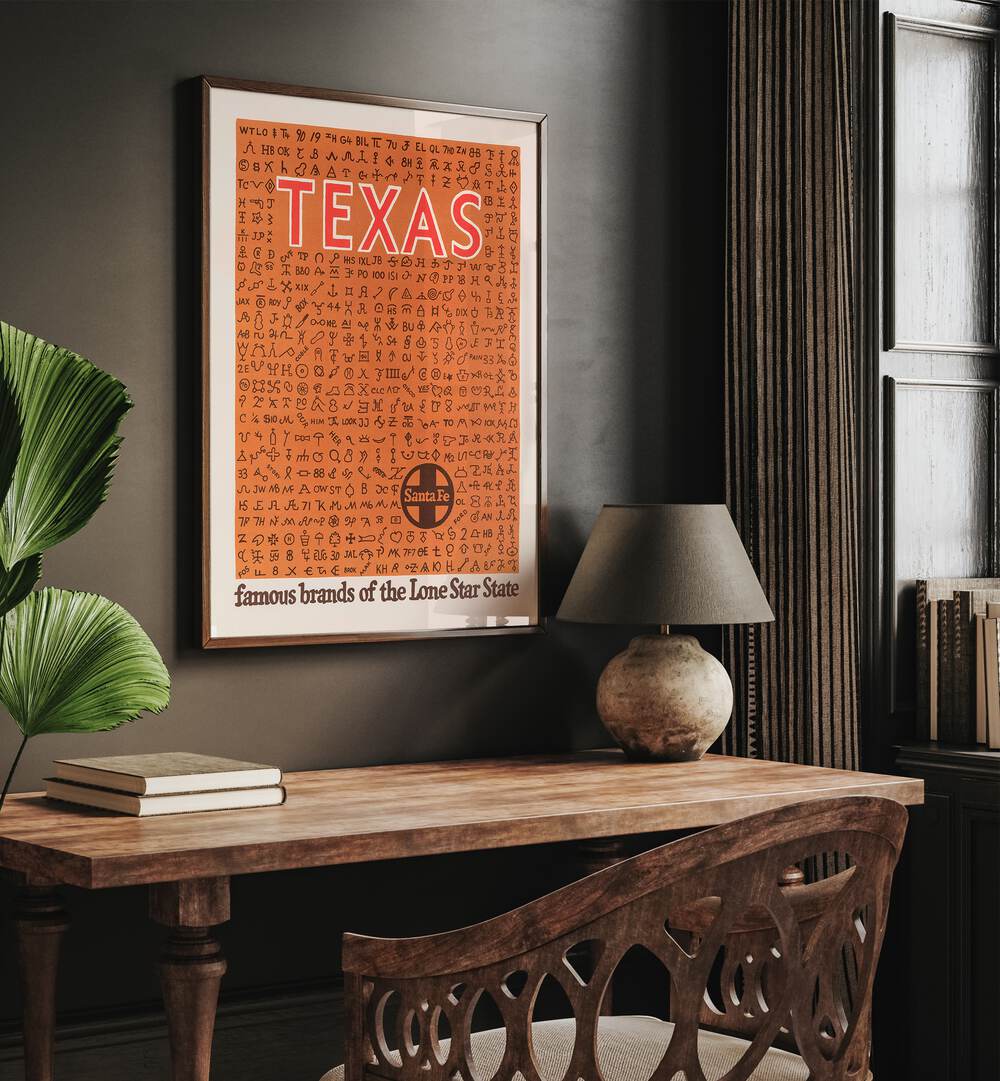 Texas  Retro Travel Posters in Oak Wood Plain Frame placed on a wall behind a study table