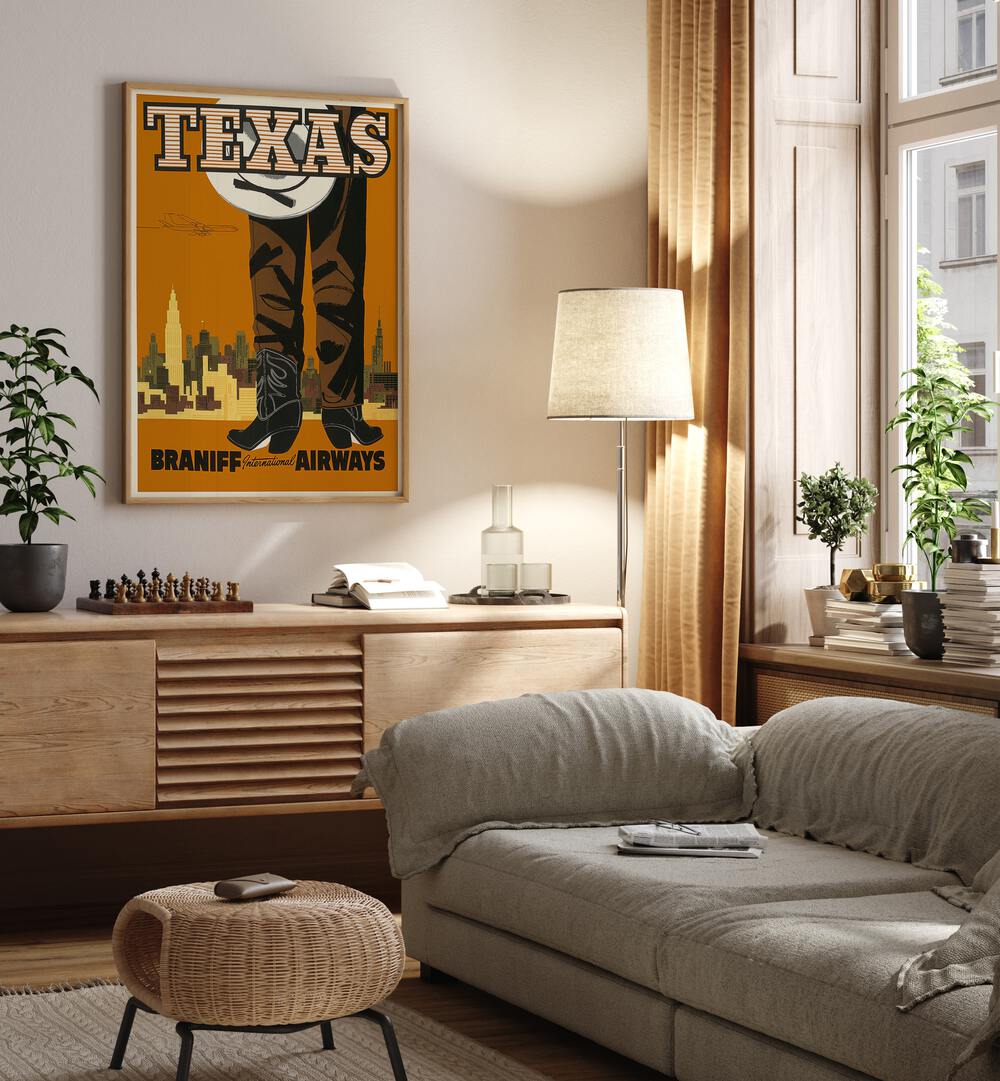 Texas-braniff International Airways  Travel Posters in Oak Wood Plain Frame placed on a wall behind a console table 