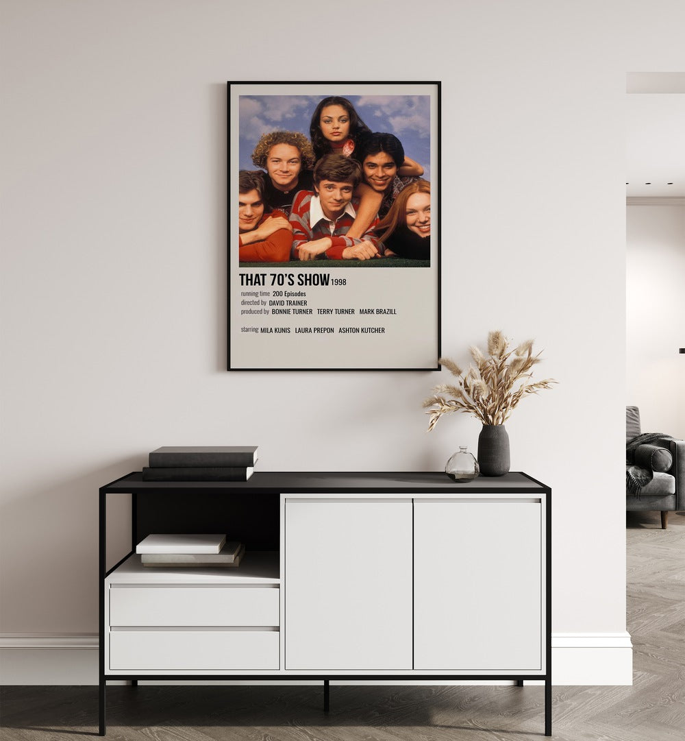 That 70s Show 1998 Movie Posters in Black Plain Frame placed on a white wall behind a black and white table