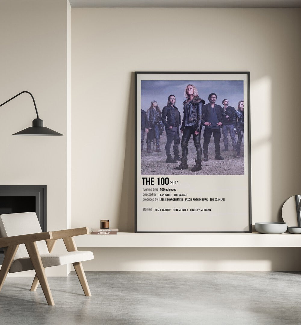 The 100 2014 I Movie Posters in Black Plain Frame placed on a shelf beside a hearth