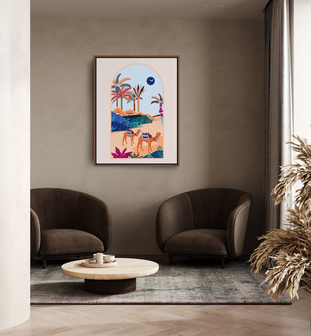 The Arbian Desert By Uma Gokhale Landscape Art Prints in Oak Wood Floater Frame on a beige wall behind and in between two sofas