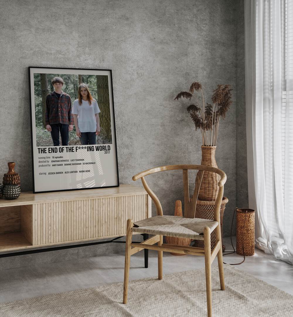 The End Of The F***ing World Movie Posters in Black Plain Frame placed on a console behind a chair