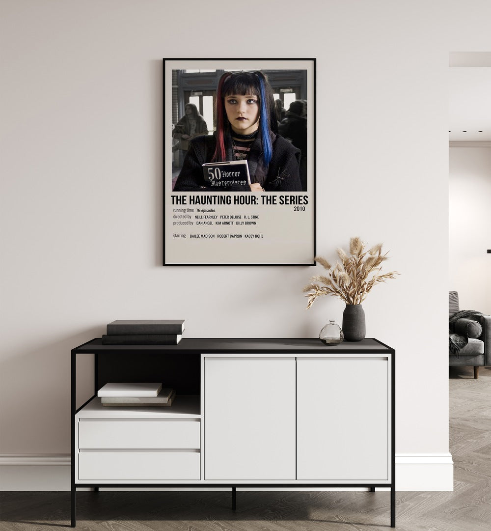 The Haunting Hour-The Series 2010 Movie Posters in Black Plain Frame placed on a white wall behind a table