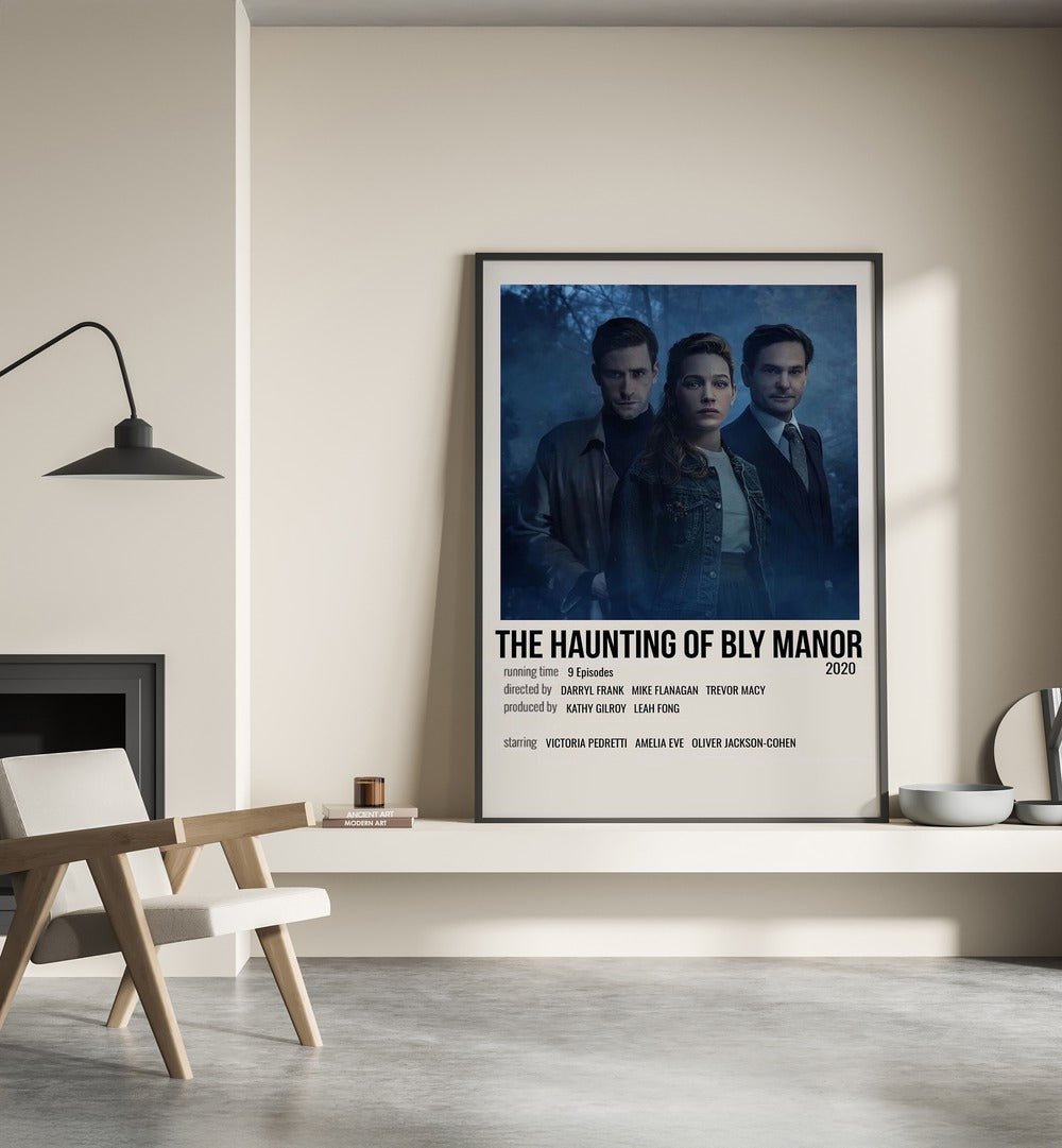 The Haunting Of Bly Manor 2020 Movie Posters in Black Plain Frame placed on a shelf beside a hearth