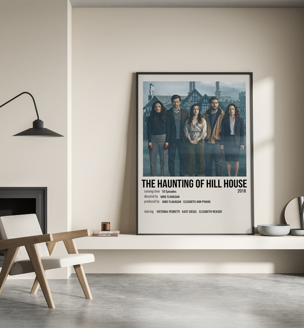 The Haunting Of Hill House 2018 ii Movie Posters in Black Plain Frame placed on a shelf beside a hearth