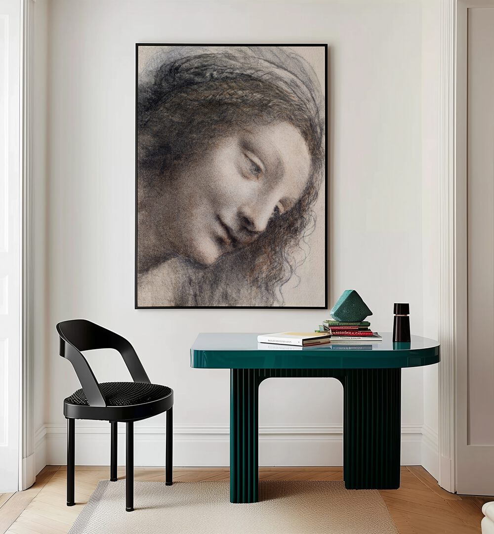 The Head Of The Virgin C.1510–1513 Vintage Paintings in Black Plain Frame placed on a wall behind a study table