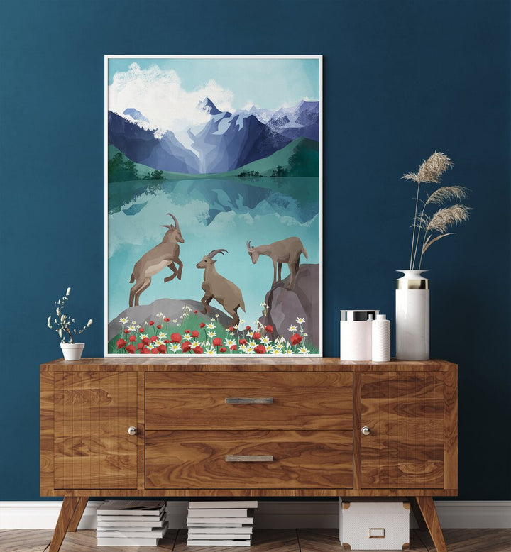 The Hills Are Alive By Goed Blauw Kids Room Art in White Plain Frame placed on a Console Table near a Blue Colored Wall in the Drawing Room