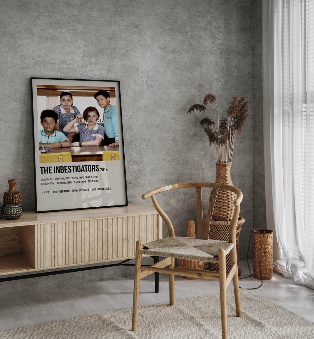 The Inbestigators 2019 Movie Posters in Black Plain Frame placed on a console behind a chair