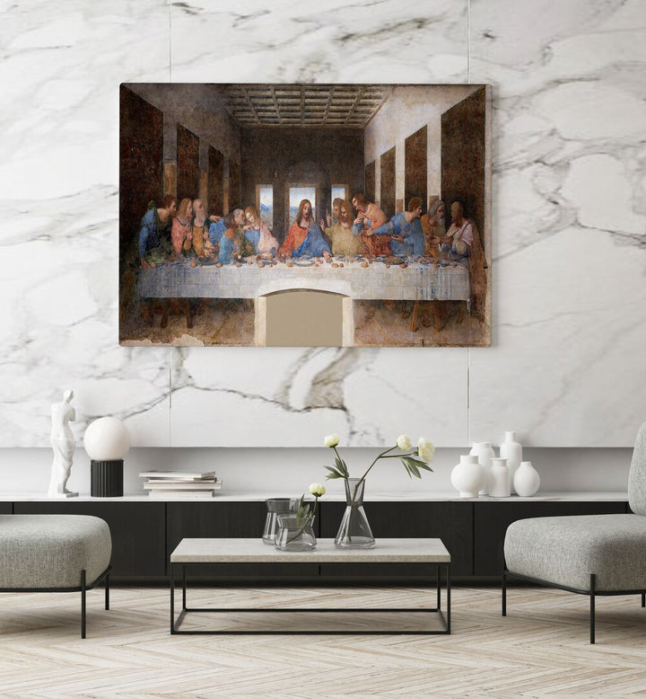 The Last Supper 1495-1498 Vintage Paintings in Gallery Wrap placed on a wall behind a table and chairs