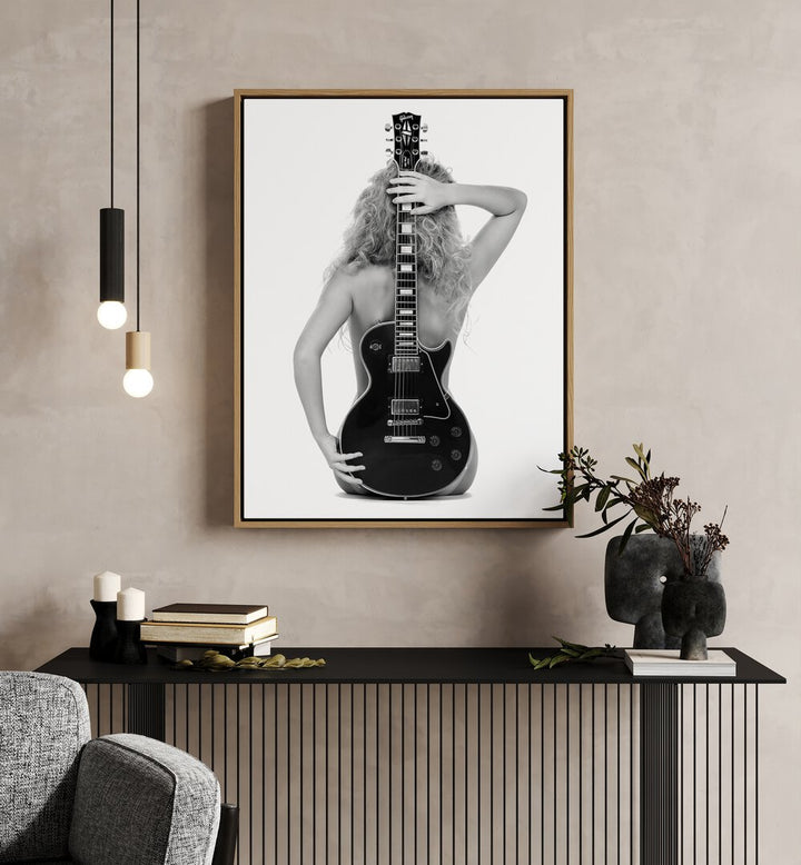 The Les Pau by David Drake Fine Art Photography Fashion Photography in Oak Wood Floater Frame placed on a wall behind a table